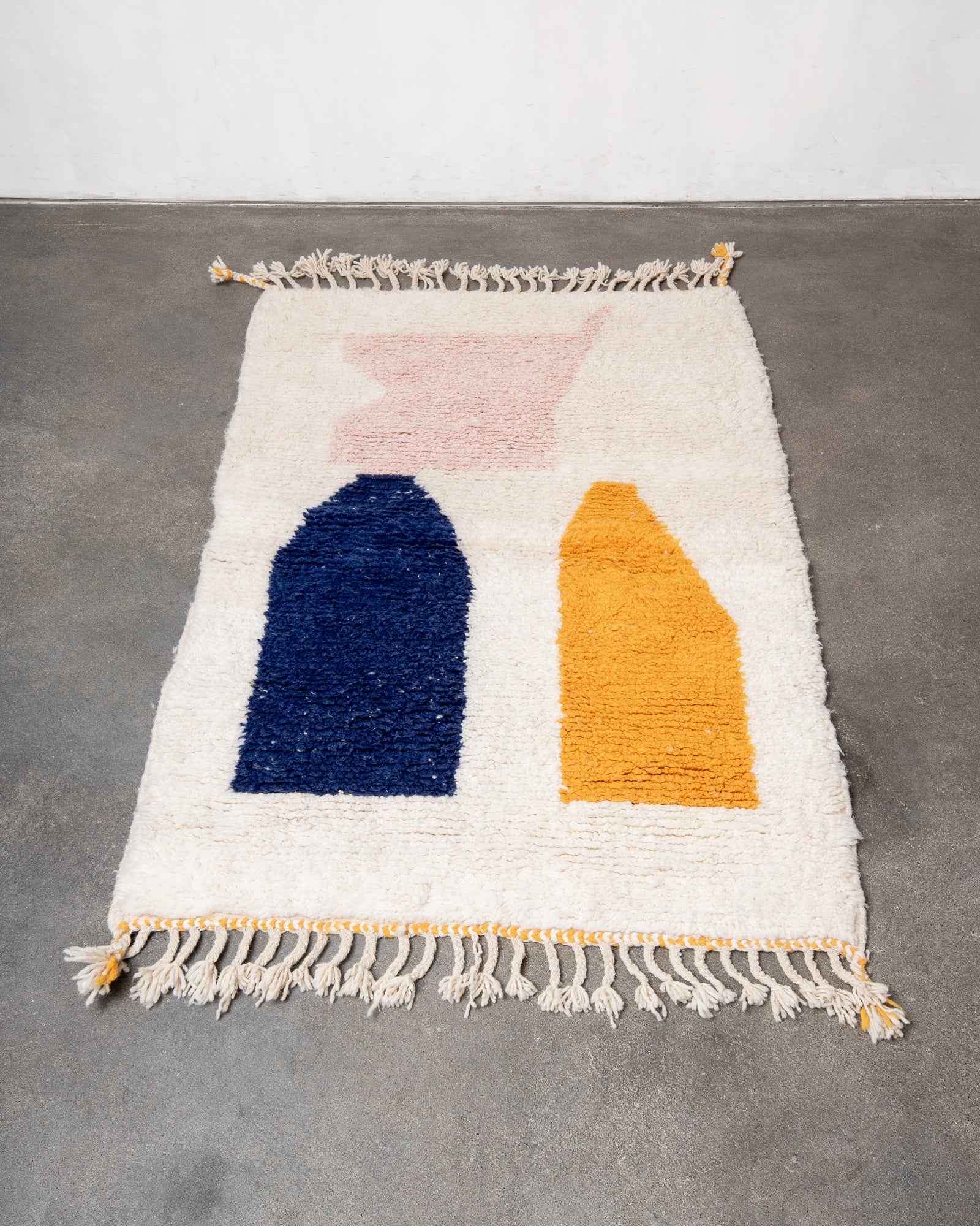 Modern, designer, handcrafted Berber rug from Morocco. Beniourain carpet with beautiful colours and patterns and fluffy wool texture.